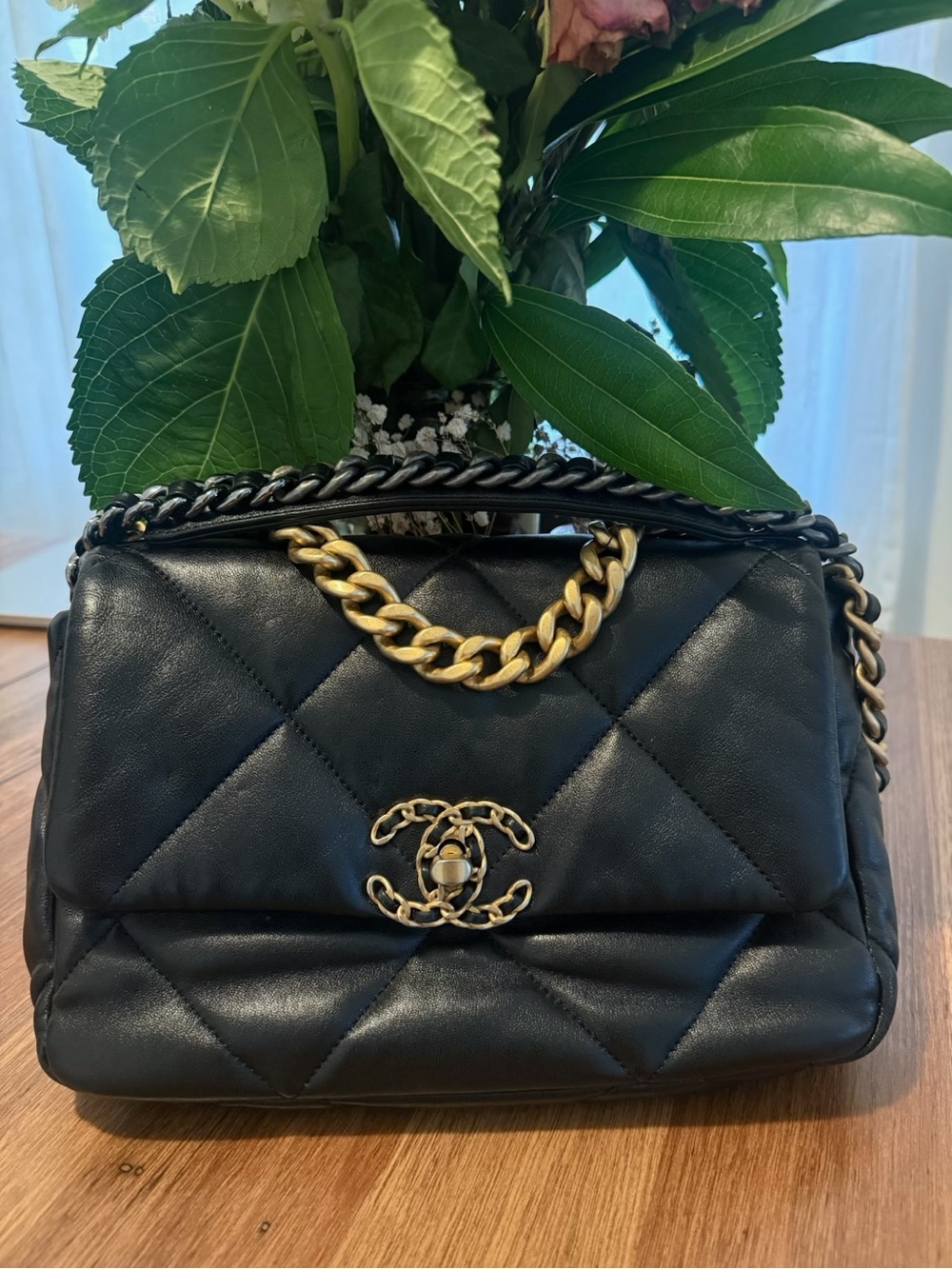 Authentic Chanel Black Quilted Leather Shoulder Bag with Gold Chain